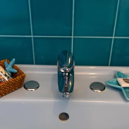Kore, Prázdninový dům Capo Vaticano