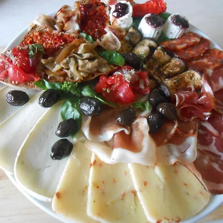 Kore, Semesterbostad Capo Vaticano